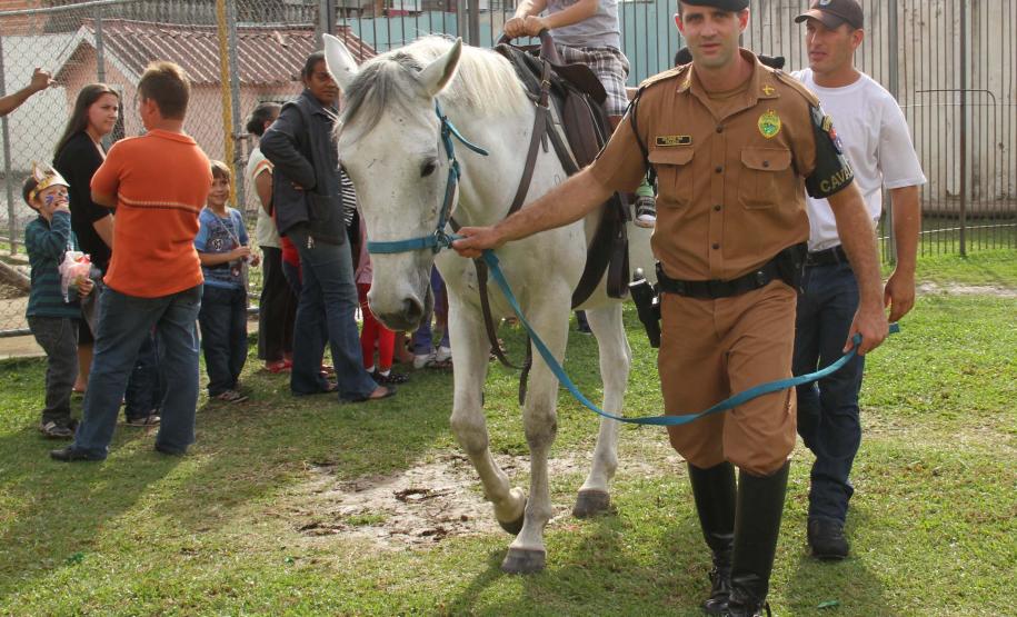 Comunidade participa de evento da PM na UPS Trindade em comemoração a Páscoa Curitiba, 13 de abril de 2014.Assunto: PascoaFoto: Soldado Cristiano Godoi de Andrade-PMPR.